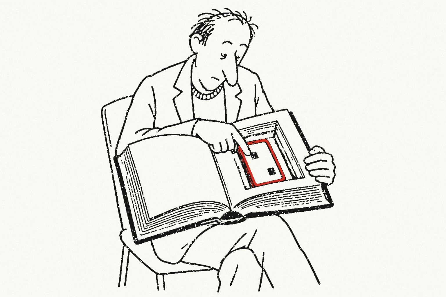 A reader sits with a thick open book. A red smartphone is hidden in a cavity cut into its pages, and he taps the screen.